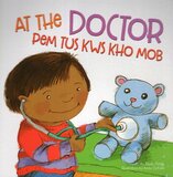 At the Doctor ( Hmong and English Edition ) (Board Book)