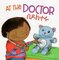 At the Doctor (Amharic/Eng) (Board Book) (6X6)
