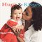 Hugs and Kisses ( Baby Faces Board Book ) (Rourke)
